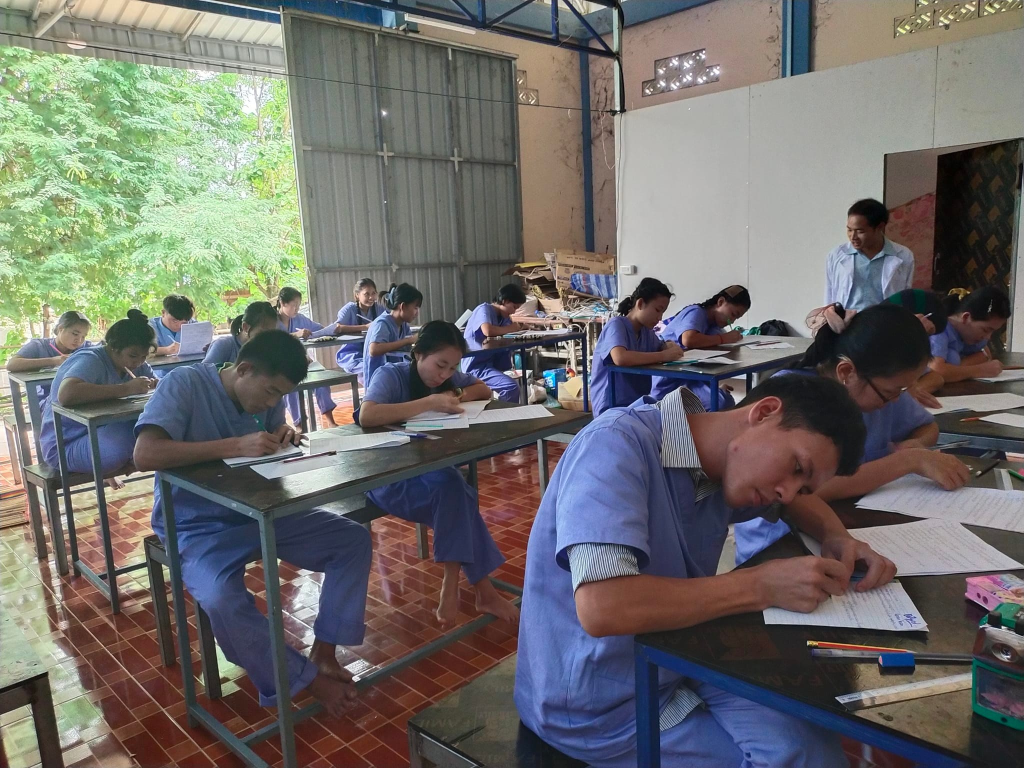 Trainee working at an auto-repair shop